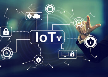 IoT security theme with a businessman in an office