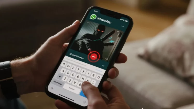 Seseorang memegang smartphone yang menampilkan modus penipuan share screen di WhatsApp, di mana peretas berusaha mengambil alih layar.