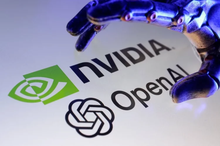 Sebuah tangan robot di atas logo kemitraan OpenAI NVIDIA, melambangkan investasi $100 miliar untuk masa depan superkomputer AI.