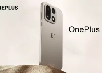 Gambar teaser resmi yang menampilkan desain OnePlus 15 dalam varian warna 'Dune', yang terinspirasi dari gundukan pasir.