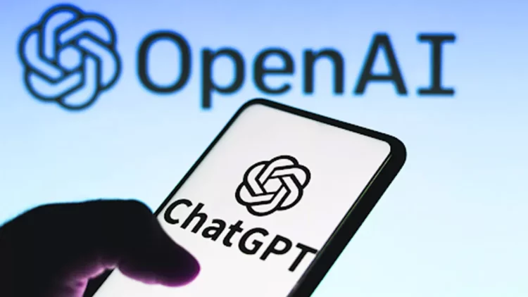 Logo ChatGPT di layar smartphone dengan logo OpenAI di latar belakang, mengilustrasikan studi tentang cara orang memakai ChatGPT.