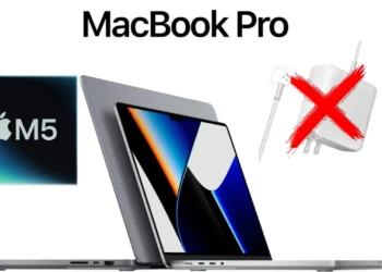 Ilustrasi MacBook Pro M5 di samping gambar charger yang dicoret, sebagai visualisasi kontroversi MacBook tanpa charger yang dibahas dalam artikel.