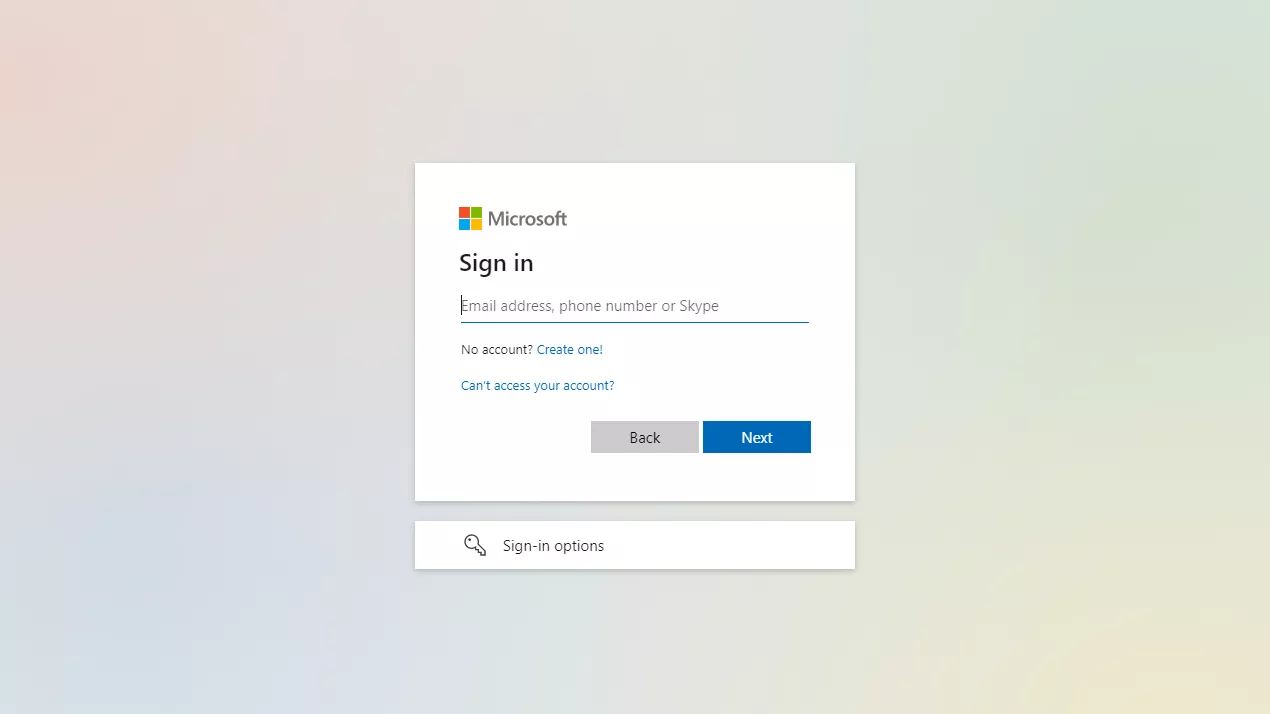 Tampilan layar login akun Microsoft dengan kolom input email/nomor telepon dan opsi untuk membuat atau mengakses akun, di latar belakang gradasi warna lembut.