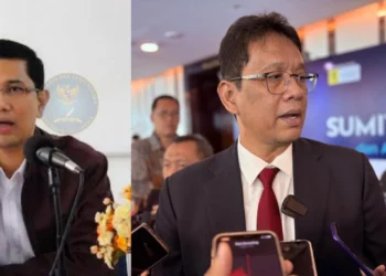 Menkeu Purbaya Yudhi Sadewa berbicara kepada media, di samping gambar Heru Sutadi dari ICT Institute, mengkritik sesumbar Menkeu Purbaya tentang keamanan siber dan peran BSSN