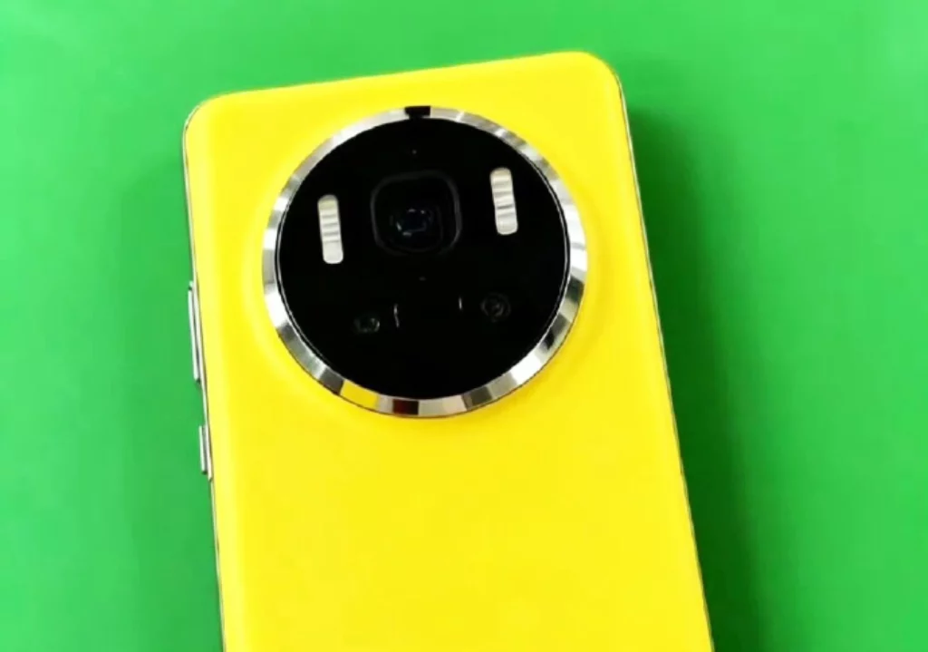 Render Huawei Mate 80 warna kuning, menunjukkan desain modul kamera melingkar yang dirumorkan akan di-upgrade dengan sensor 50MP LOFIC.