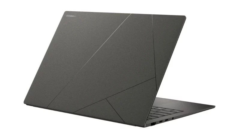 Tampilan belakang laptop Asus Zenbook S 14 UX5406, salah satu laptop tipis ringan terbaik, yang menonjolkan desain sasis premium dan bodinya yang tipis.