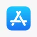 Logo ikon aplikasi App Store berwarna putih di atas latar belakang biru muda, merupakan simbol resmi dari platform distribusi aplikasi Apple.
