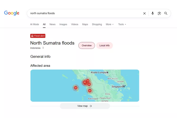 Tampilan antarmuka Google Maps di smartphone yang menunjukkan ikon peringatan banjir (Flood Alert) di area terdampak di Sumatera.