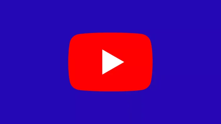 Logo play button merah ikonik YouTube di tengah latar belakang berwarna biru tua.