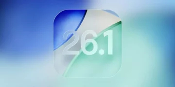 Logo visual angka "26.1" dengan desain glassmorphism di atas latar belakang blur gradasi biru dan hijau, merepresentasikan update sistem operasi iOS 26.1.