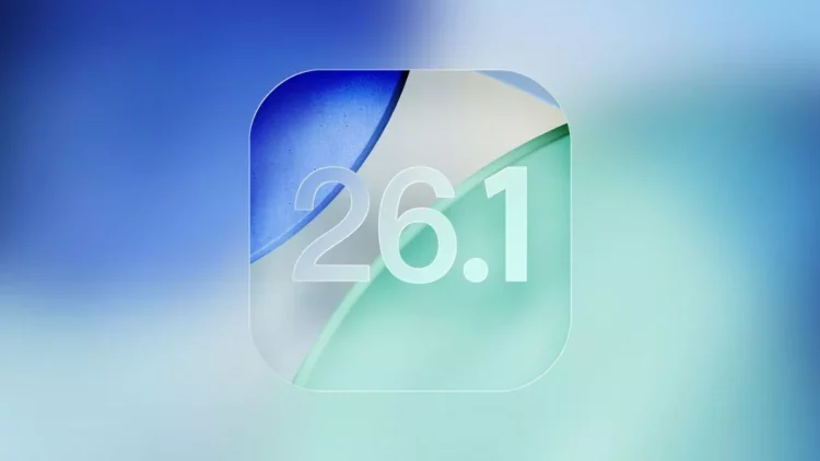 Logo visual angka "26.1" dengan desain glassmorphism di atas latar belakang blur gradasi biru dan hijau, merepresentasikan update sistem operasi iOS 26.1.