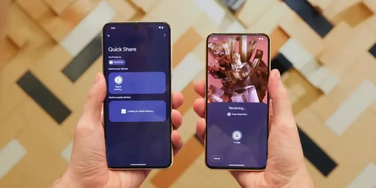 Tampilan smartphone Android dengan fokus pada ikon konektivitas atau fitur berbagi, menyoroti fungsi Quick Share.