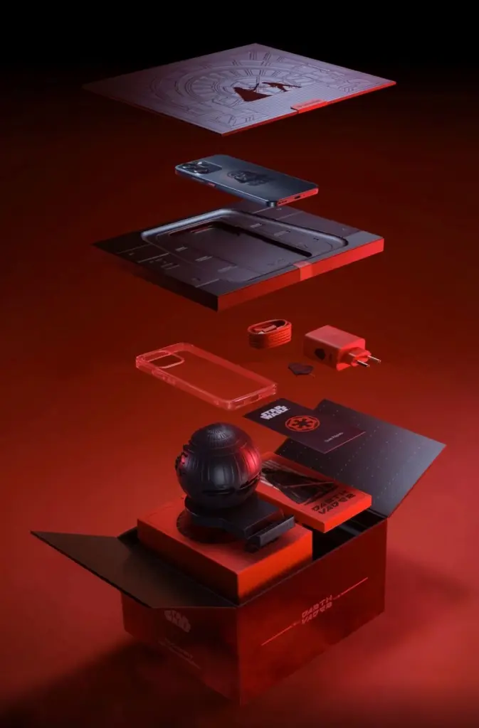 Paket kolektor Oppo Reno14 F Star Wars, menunjukkan desain premium "Dark Side" yang menyeluruh, mulai dari box, HP, charger, hingga phone stand mini Death Star.
