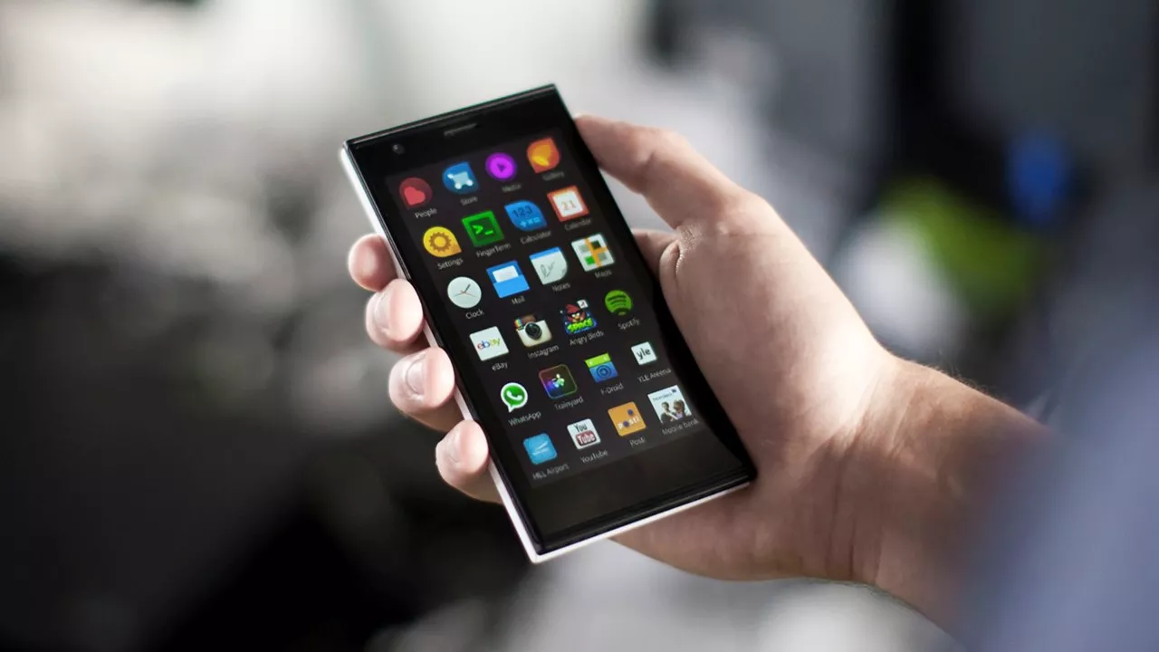 Tampilan layar smartphone (mewakili Jolla Phone) yang menunjukkan antarmuka sistem operasi baru yang ringan dan fokus pada gestur.