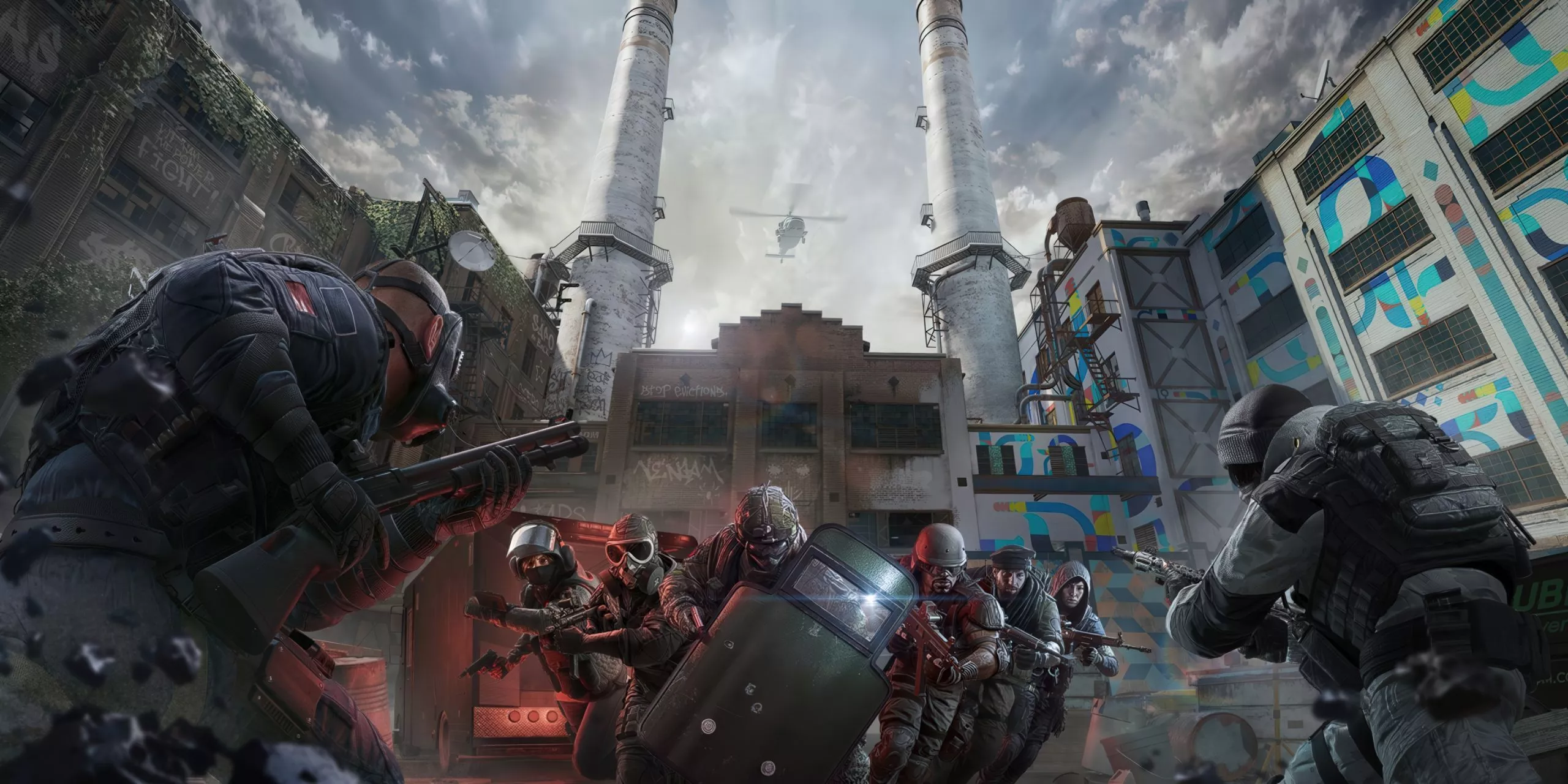 Logo Tom Clancy's Rainbow Six Siege dengan latar belakang tiga operator di sebuah stadion.