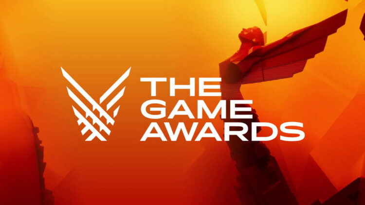 Logo resmi The Game Awards 2025 dengan latar belakang gradasi oranye dan patung ikonik bersayap.