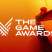 Logo resmi The Game Awards 2025 dengan latar belakang gradasi oranye dan patung ikonik bersayap.