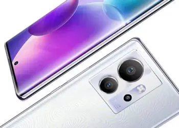 Close-up modul kamera belakang dua unit smartphone dengan desain dual-tone abu-abu dan perak, menyimbolkan desain flagship baru Infinix.