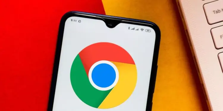 Smartphone dengan latar belakang teknologi, menyimbolkan masalah keamanan data atau konflik software antara Apple dan Google Chrome.
