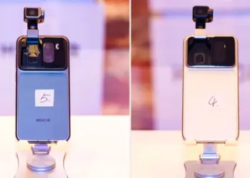 Tampilan prototipe Honor Robot Phone yang menampilkan modul kamera dengan lengan robotik mekanis yang sedang memanjang ke atas untuk mengambil sudut foto otomatis.