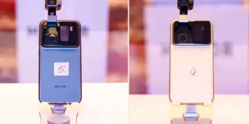 Tampilan prototipe Honor Robot Phone yang menampilkan modul kamera dengan lengan robotik mekanis yang sedang memanjang ke atas untuk mengambil sudut foto otomatis.