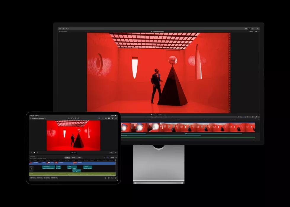Perangkat monitor Mac dan iPad menjalankan aplikasi editing video dari Apple Creator Studio dengan proyek visual berwarna merah.