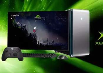 Ilustrasi konsep Xbox terbaru yang menyerupai PC desktop Windows lengkap dengan monitor, keyboard, mouse, dan controller Xbox Series di latar hijau.