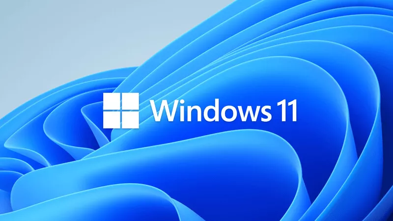 Logo resmi Microsoft Windows 11 dengan latar belakang wallpaper Bloom berwarna biru.