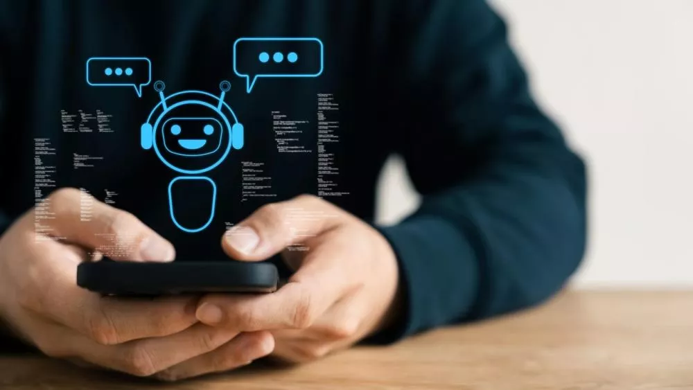 Seseorang menggunakan smartphone Android yang menampilkan ikon chatbot AI dengan enkripsi data yang bocor di latar belakang gelap.
