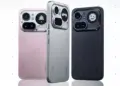 Tiga unit Nothing Phone 4a Pro dalam varian warna Pink, Abu-abu, dan Hitam menunjukkan desain modul kamera belakang yang unik dengan layar dot matrix.