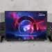 Detail kontroler Lenovo Legion GO foldable dengan joystick RGB dan layout tombol gaming profesional.