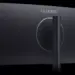 Tampilan bagian belakang monitor gaming Huawei ultraride berwarna hitam minimalis dengan logo perak.