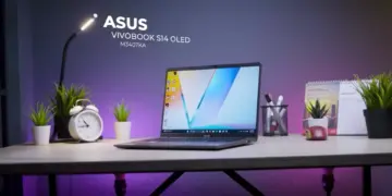 Laptop ASUS Vivobook S14 OLED M3407KA dengan desain tipis dan layar OLED jernih di atas meja kerja.