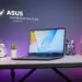 Laptop ASUS Vivobook S14 OLED M3407KA dengan desain tipis dan layar OLED jernih di atas meja kerja.