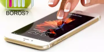 Ilustrasi ikon baterai lemah dengan teks "BOROS?" di samping smartphone.