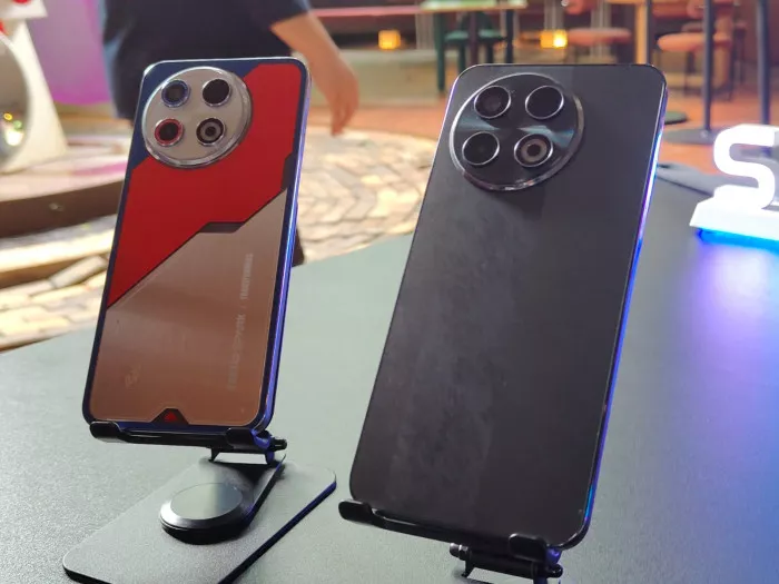 Dua unit HP baru rilis edisi spesial dengan modul kamera bulat besar, salah satunya varian warna merah-silver bergaya robotik.