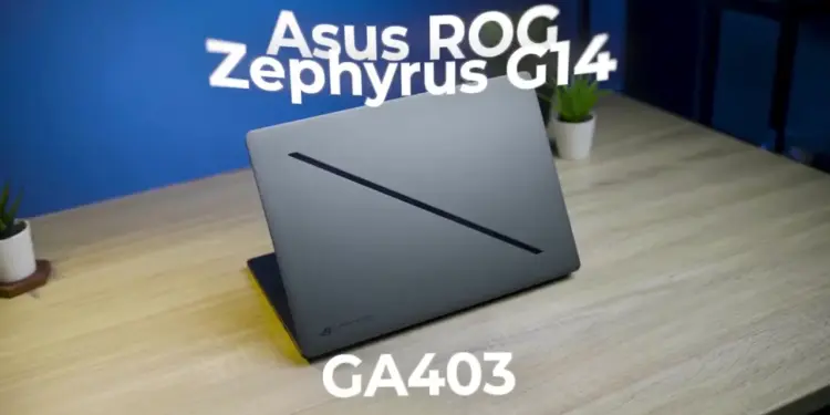 Desain premium bodi sasis CNC aluminum laptop gaming ASUS ROG Zephyrus G14 GA403 dengan fitur Slash Lighting minimalis di atas meja.