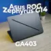 Desain premium bodi sasis CNC aluminum laptop gaming ASUS ROG Zephyrus G14 GA403 dengan fitur Slash Lighting minimalis di atas meja.
