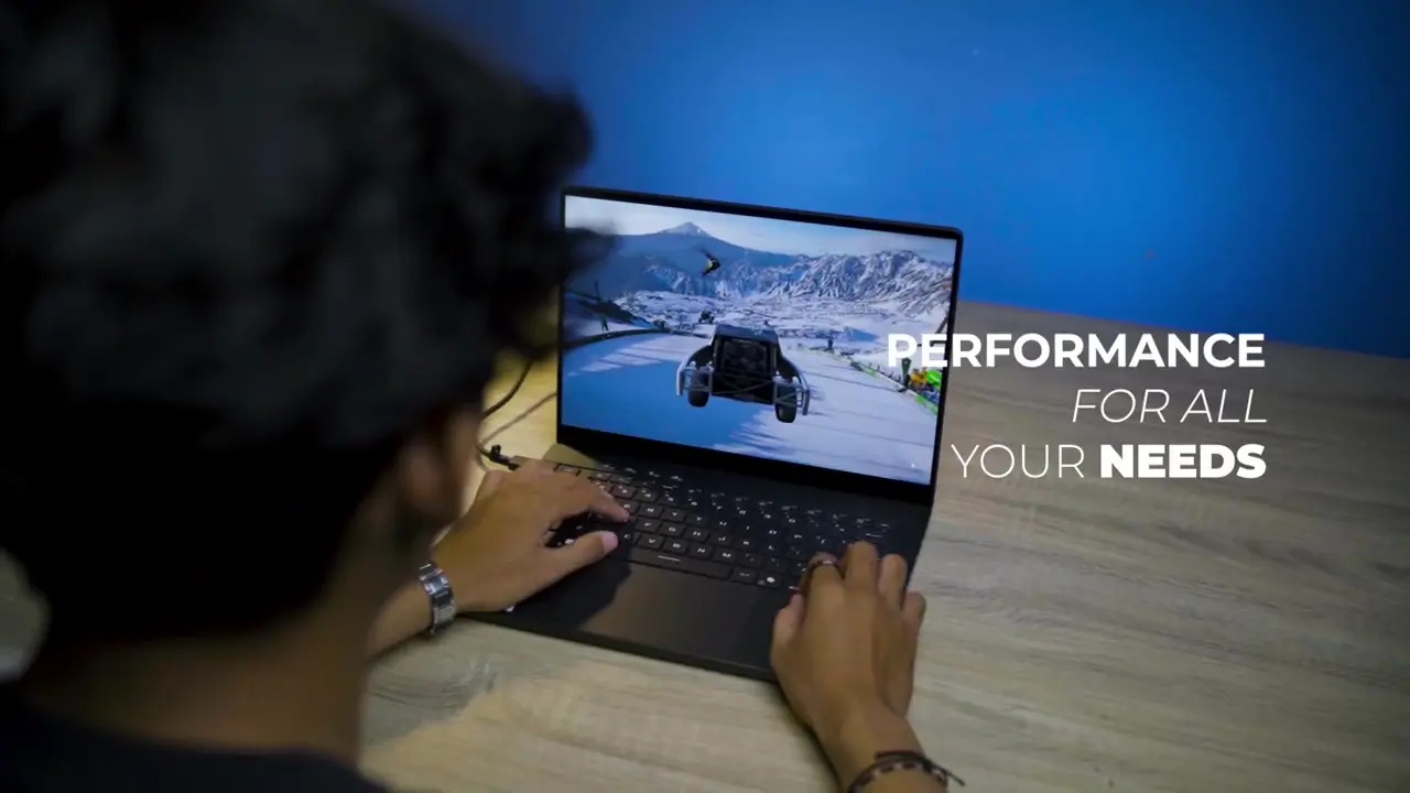 Seorang pengguna sedang mengoperasikan laptop gaming premium ASUS ROG Zephyrus G14 yang memiliki konstruksi bodi tipis dan ringkas di atas meja kerja.