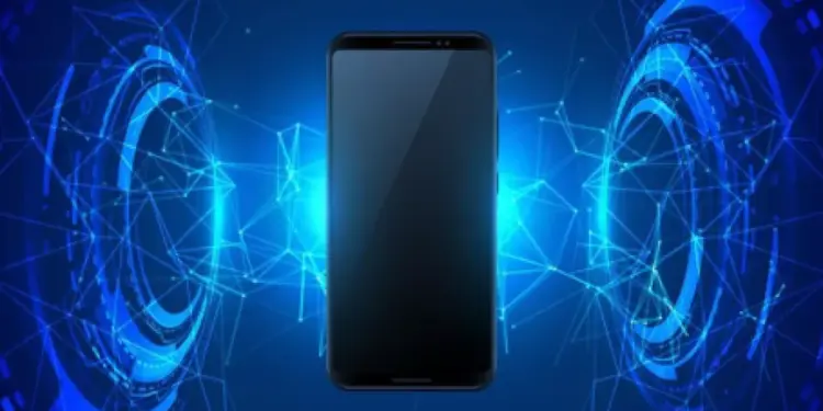 Ilustrasi smartphone hitam berada di tengah pancaran jaringan teknologi dan gelombang elektromagnetik.