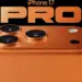 Modul kamera belakang iPhone 17 Pro warna oranye yang menjadi inspirasi desain HP Android murah.