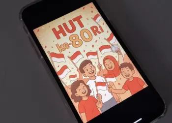 Desain poster HUT RI ke-80 bergaya ilustrasi kartun meriah yang ditampilkan pada layar ponsel pintar.