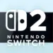 Konsol genggam Nintendo Switch 2 warna hitam dengan logo resmi di bagian layar.