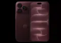 Tampilan depan dan belakang HP Flagship iPhone 16 Pro warna Deep Red dengan wallpaper estetis.