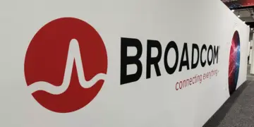 Logo Broadcom, raksasa semikonduktor yang mencatatkan lonjakan pendapatan fantastis dari sektor kecerdasan buatan.