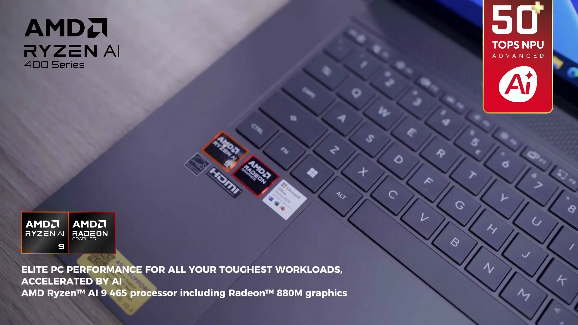 Close-up area keyboard dan deck laptop ASUS Zenbook S16 OLED berwarna Antrum Grey dengan stiker AMD Ryzen AI 9.