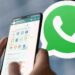 Pengguna mengoperasikan aplikasi pesan instan di smartphone dengan ikon resmi penangkal WhatsApp Palsu.