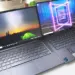 Perbandingan dua laptop Lenovo Yoga Pro 7i dan IdeaPad Slim di atas meja kerja